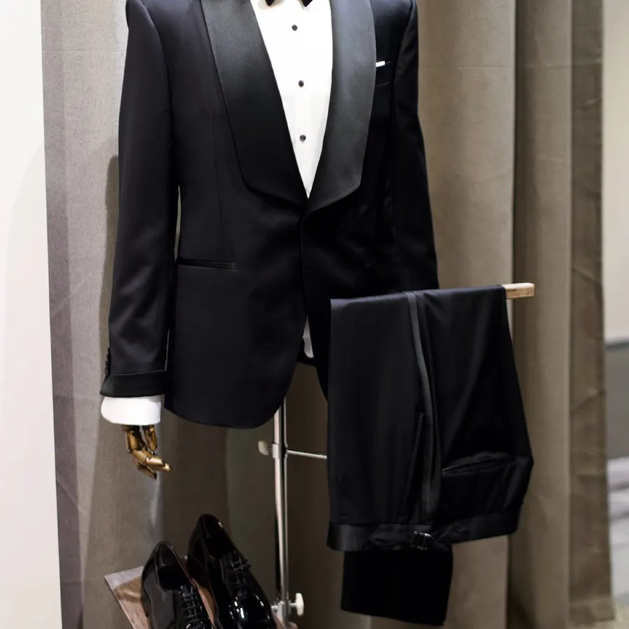 Dinner jacket and bow tie on display