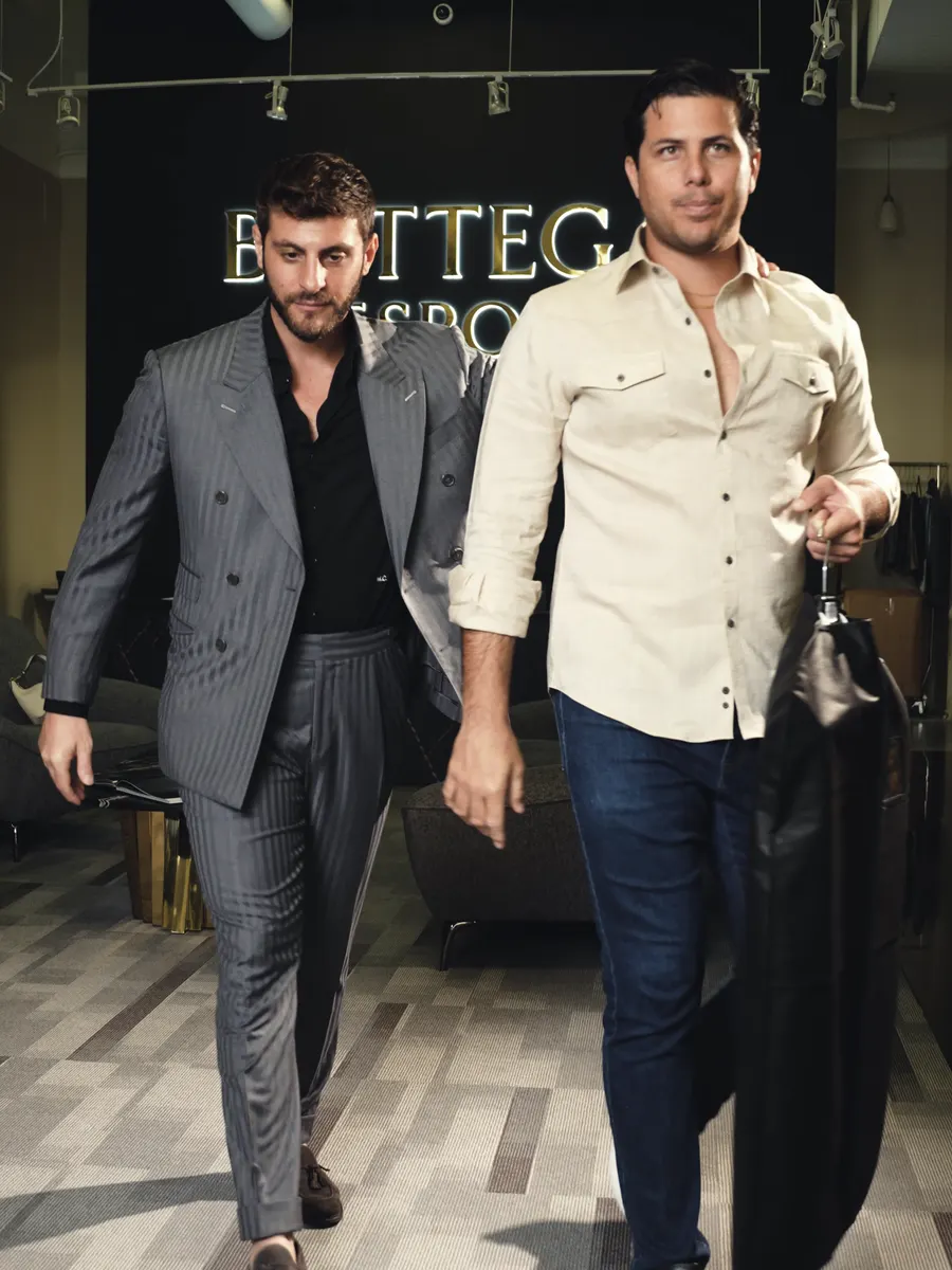Leaving the showroom with the garment bag